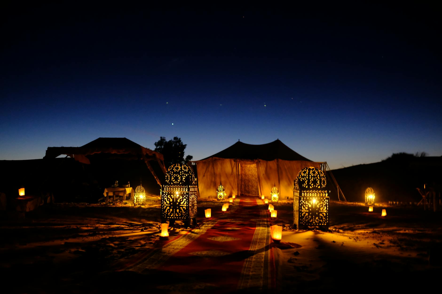 An outdoor star bed sleeping platform under the African night sky at Loisaba Conservancy in Laikipia