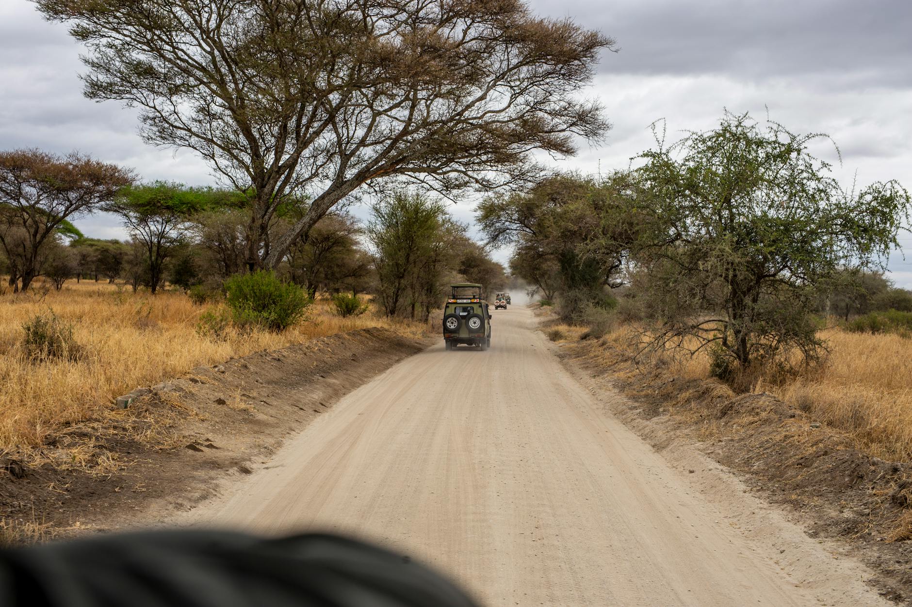 Safari vehicle on road to Laikipia Kenya from Nairobi
